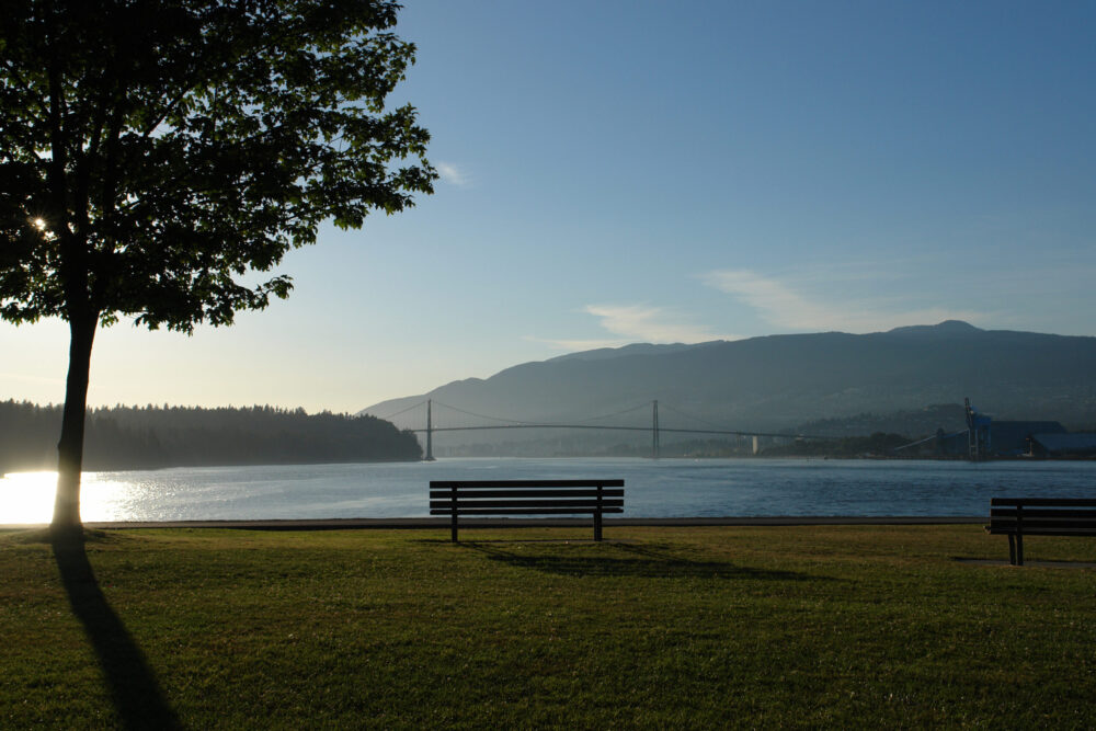Bench overlooking the water and mountains